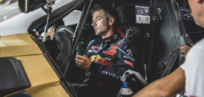 Sebastien Loeb nell'abitacolo della Peugeot 2008 DKR durante i test svolti in Marocco a metà giugno.